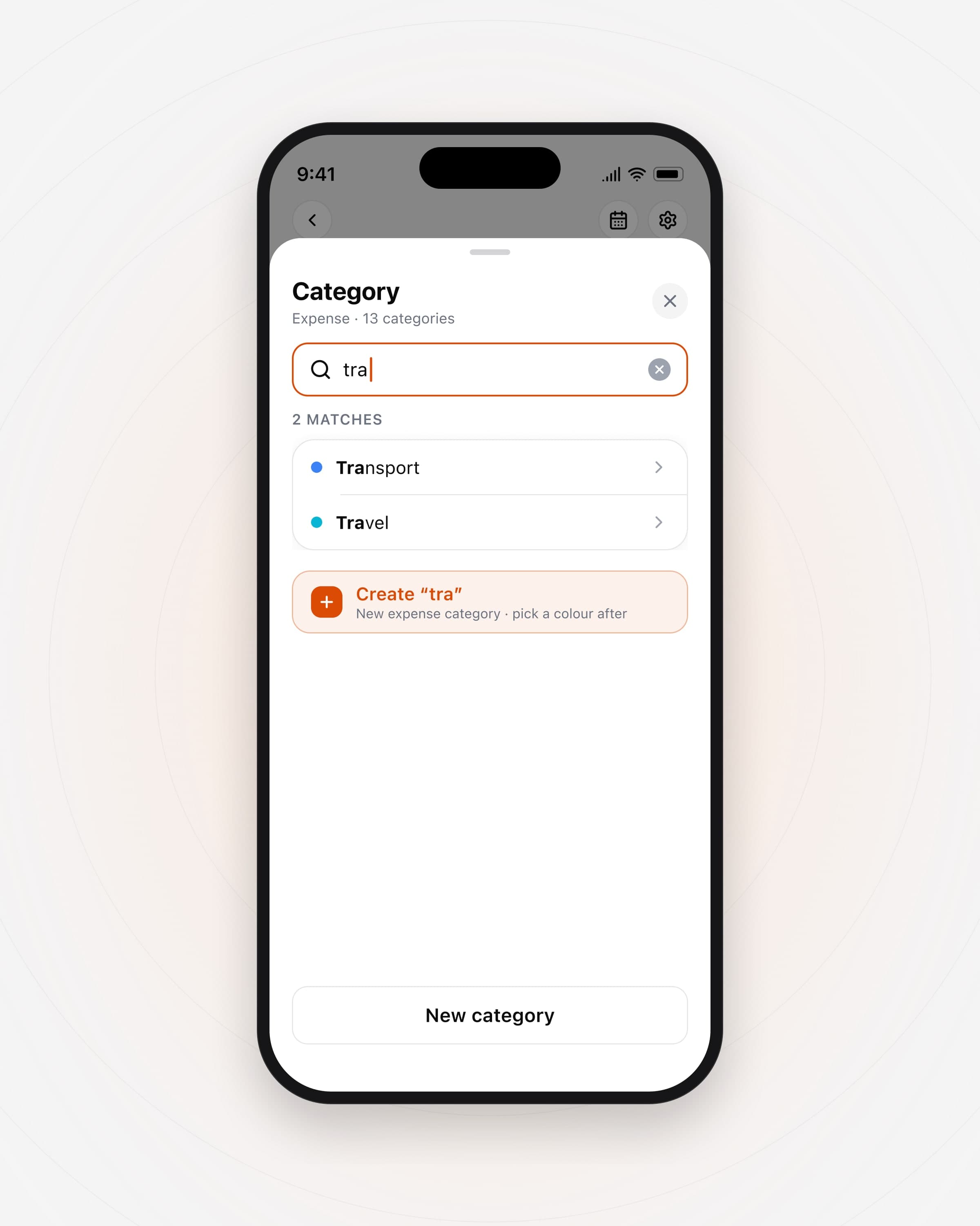The category picker filtered by typing “tra”, with Transport, Travel and an option to create a new category.