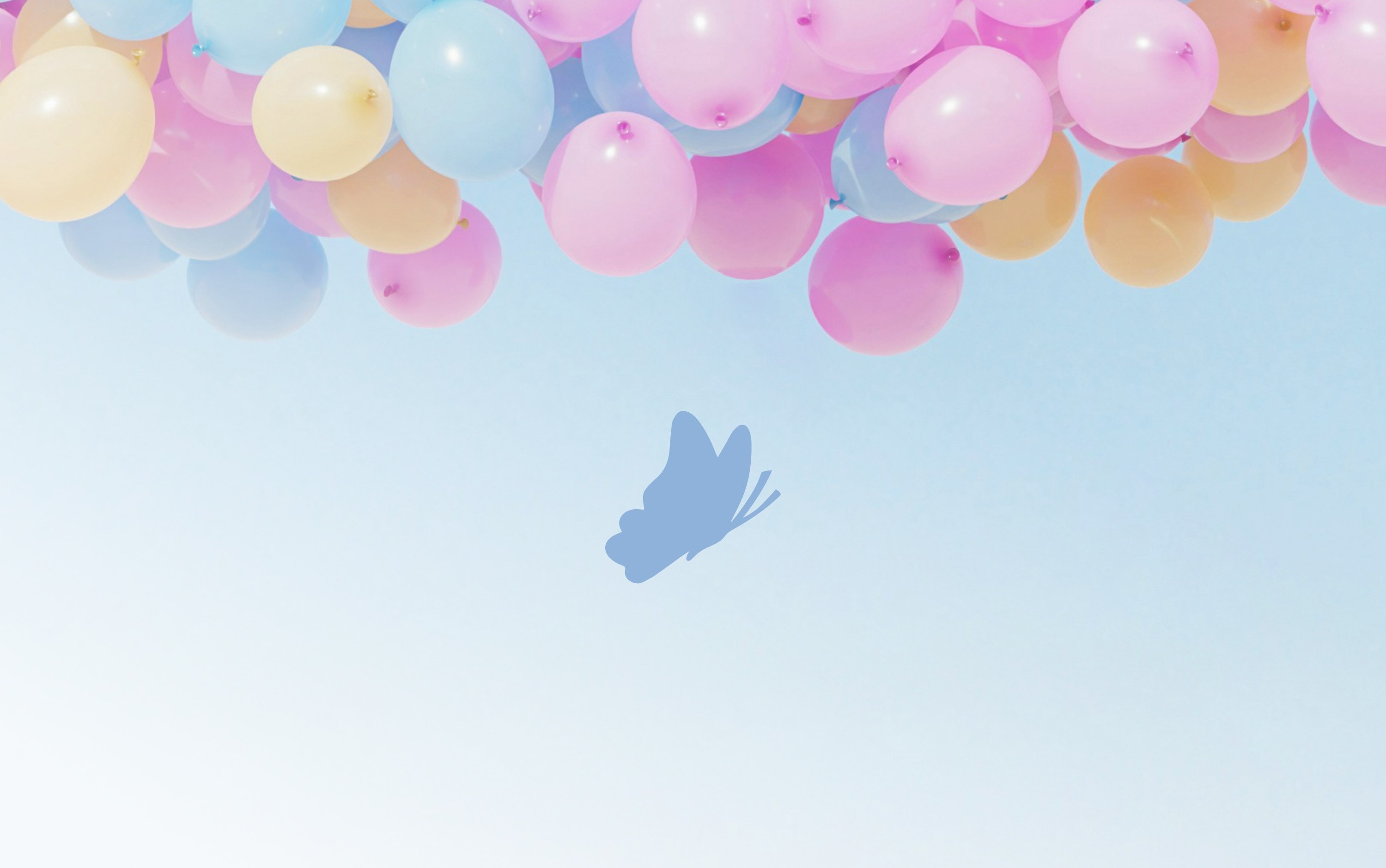 Pastel balloons along the top of a pale blue sky, with the Vivis butterfly alone in the middle.